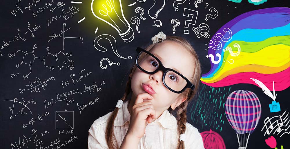 girl thinking about math formula in front of imaginative chalk board